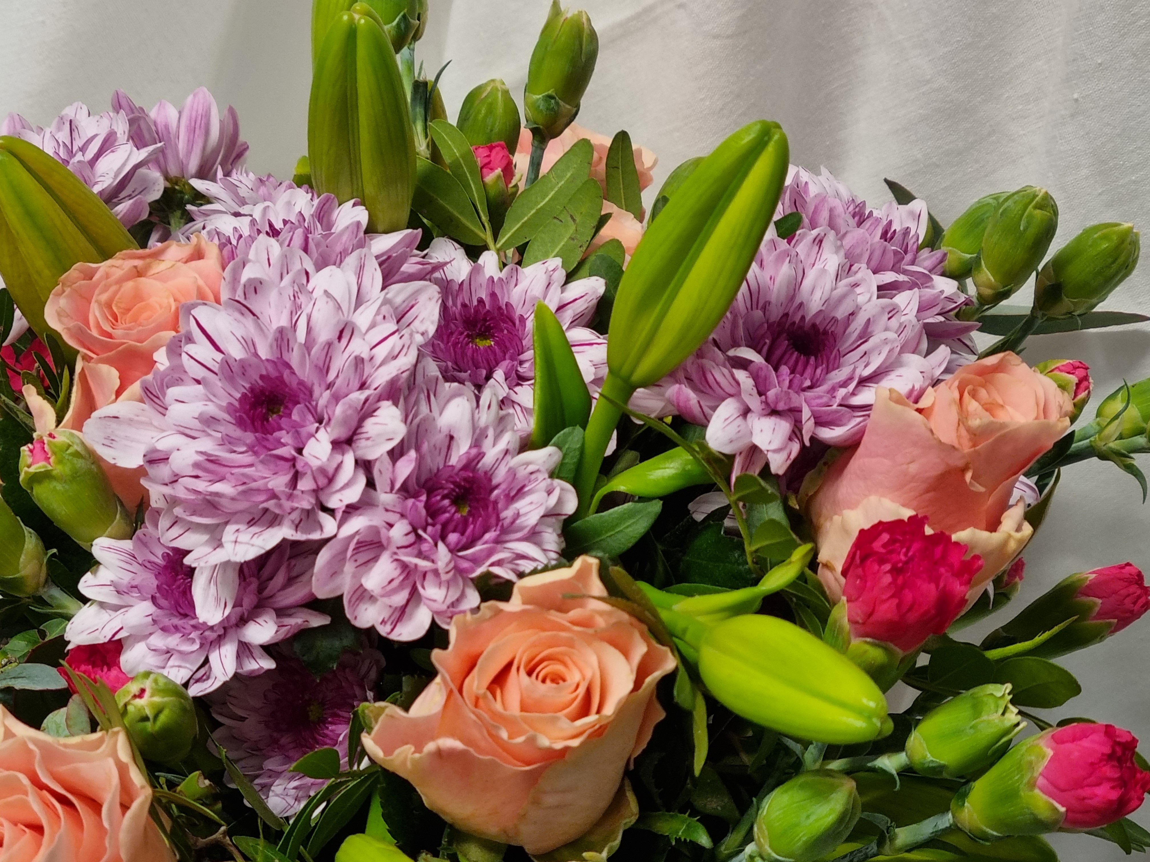 Bukett i fersken og rosa